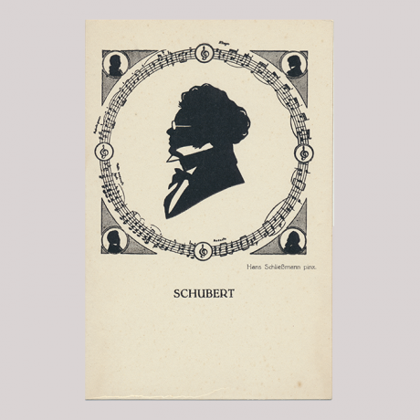 
        Front of silhouette, with man looking left, in suit and wearing galsses, in rounded painted frame, in the bottom is written Schubert.